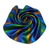 This image showcases a cross-section of a spiral shell featuring a mesmerizing array of colors and intricate patterns. The vibrant hues range from pink, blue, and green near the center to yellow, orange, and brown towards the outer edges, creating a stunn