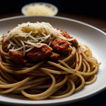 Spaghetti_with_an_Additional_Bowl_of_Shredded_Cheese